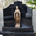 Gates Of Heaven black granite with bronze flat backed statue of Our Lady