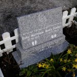 Grey granite, child memorial, footprint, hand detail